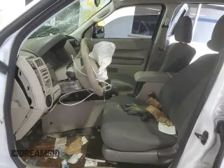 2010 Ford Escape XLS with VIN 1FMCU9C75AKD02318, listed as a Copart auction lot 59130055 with Not provided miles and Salvage title. Bid and sale history available at DreamBid. Image 7.