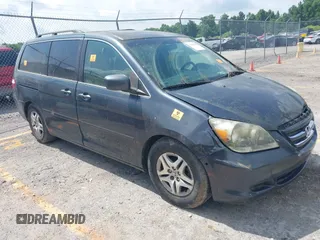 2005 Honda Odyssey EX-L with VIN 5FNRL38775B108903, listed as a IAAI auction lot 42484109 with 158,747 mi miles and . Bid and sale history available at DreamBid. Image 1.