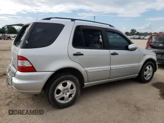 2002 Mercedes-Benz M-Class with VIN 4JGAB54E52A360097, listed as a Copart auction lot 72983104 with 199,445 mi miles and Salvage Title. Bid and sale history available at carsss.com. Image 3.