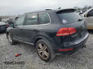 2013 Volkswagen Touareg Lux with VIN WVGEF9BP2DD006847, listed as a Copart auction lot 87613955 with 157,200 mi miles and Salvage Title. Bid and sale history available at DreamBid. Image 2.