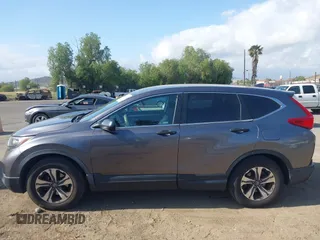 2019 Honda CR-V LX z VIN 2HKRW5H33KH401422, wystawiony jako IAAI lot #42116431 z przebiegiem 119 387 mil mil oraz . Historia ofert i sprzedaży dostępna na DreamBid. Obrazek 15.