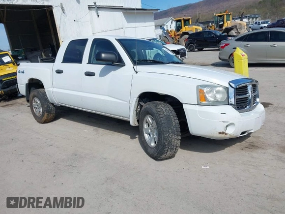 2006 Dodge Dakota SLT z VIN 1D7HW48K06S676241, wystawiony jako IAAI lot #41986300 z przebiegiem 112 215 mil mil oraz . Historia ofert i sprzedaży dostępna na DreamBid. Obrazek 1.