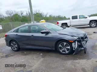 2019 Honda Civic LX with VIN 19XFC2F68KE007409, listed as a IAAI auction lot 41887406 with 57,147 mi miles and . Bid and sale history available at DreamBid. Image 13.