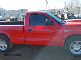 2000 Dodge Dakota SLT with VIN 1B7GL26Z6YS766872, listed as a IAAI auction lot 41854532 with 199,430 mi miles and . Bid and sale history available at DreamBid. Image 14.