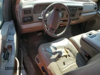 1999 Ford F-250 XL with VIN 1FTNX21SXXEE40026, listed as a Copart auction lot 69888634 with 215,535 mi miles and Salvage title. Bid and sale history available at DreamBid. Image 8.