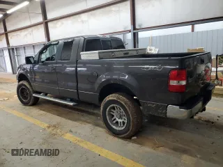2006 Ford F-150 STX with VIN 1FTRX14W66NA37122, listed as a Copart auction lot 82414464 with 235,736 mi miles and Salvage title. Bid and sale history available at DreamBid. Image 2.