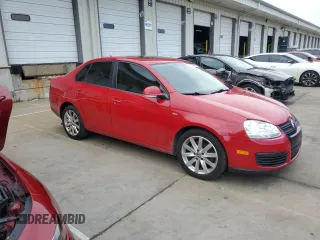 2010 Volkswagen Jetta Wolfsburg Edition with VIN 3VWRJ7AJXAM154666, listed as a Copart auction lot 60556875 with 149,509 mi miles and Salvage title. Bid and sale history available at DreamBid. Image 4.