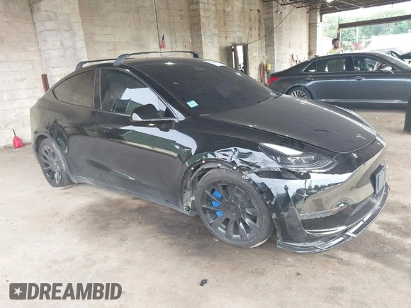 2023 Tesla Model Y Long Range with VIN 7SAYGDEE3PA185778, listed as a IAAI auction lot 39721611 with 11,986 mi miles and . Bid and sale history available at DreamBid. Image 1.
