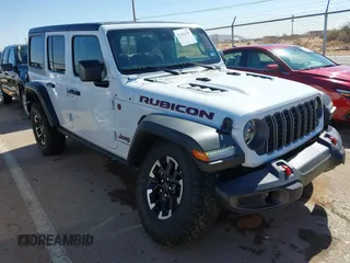 2025 Jeep Wrangler Rubicon with VIN 1C4PJXFN8SW527131, listed as a IAAI auction lot 41502676 with 1,051 mi miles and . Bid and sale history available at DreamBid. Image 1.