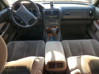 1990 Lexus LS z VIN JT8UF11E1L0014976, wystawiony jako Copart lot #80498914 z przebiegiem 149 419 mil mil oraz Szkoda całkowita • Salvage title. Historia ofert i sprzedaży dostępna na DreamBid. Obrazek 8.