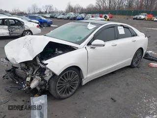 2014 Lincoln MKZ with VIN 3LN6L2J99ER819229, listed as a IAAI auction lot 41005075 with Not Provided miles. Bid and sale history available at carsss.com. Image 2.