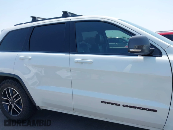 2019 Jeep Grand Cherokee Trailhawk with VIN 1C4RJFLT7KC751143, listed as a IAAI auction lot 42749406 with 54,024 mi miles and . Bid and sale history available at DreamBid. Image 14.