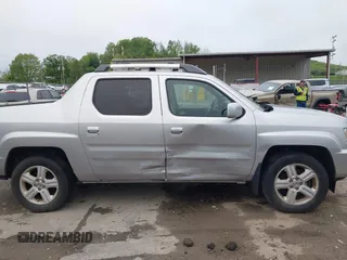 2012 Honda Ridgeline RTL with VIN 5FPYK1F58CB454385, listed as a IAAI auction lot 42212805 with 207,874 mi miles and . Bid and sale history available at DreamBid. Image 13.