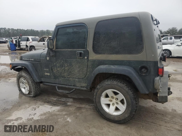 2005 Jeep Wrangler Rubicon with VIN 1J4FA69S95P377014, listed as a Copart auction lot 42676915 with 130,571 mi miles and Salvage Title. Bid and sale history available at carsss.com. Image 2.