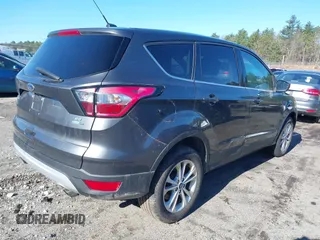 2017 Ford Escape SE with VIN 1FMCU9GD6HUC70333, listed as a IAAI auction lot 41920087 with 67,441 mi miles. Bid and sale history available at carsss.com. Image 4.