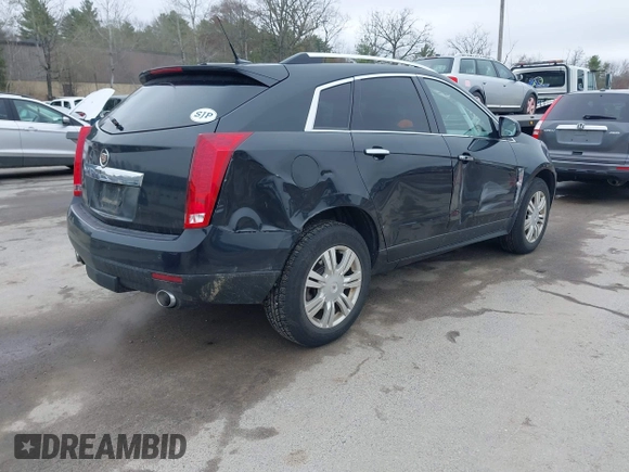 2011 Cadillac SRX Luxury Collection with VIN 3GYFNDEY2BS530669, listed as a IAAI auction lot 42083845 with 174,894 mi miles and . Bid and sale history available at carsss.com. Image 4.