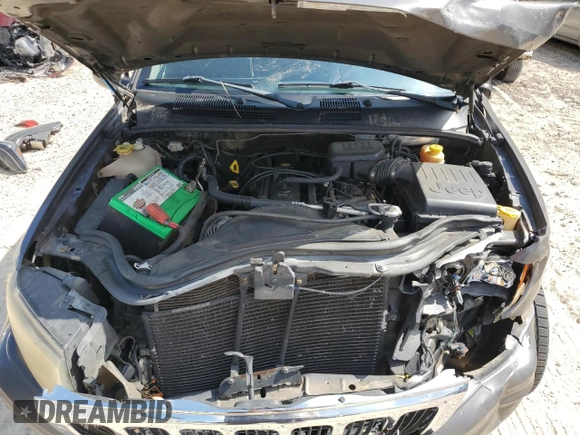 2002 Jeep Grand Cherokee with VIN 1J8GX48S12C255290, listed as a Copart auction lot 57832025 with 191,293 mi miles and Non repairable. Bid and sale history available at DreamBid. Image 12.