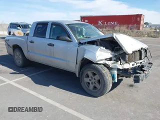 2005 Dodge Dakota SLT with VIN 1D7HW48N45S127702, listed as a IAAI auction lot 41492769 with 1 mi miles. Bid and sale history available at carsss.com. Image 1.
