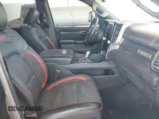 2022 Ram 1500 TRX with VIN 1C6SRFU97NN353587, listed as a IAAI auction lot 42174702 with 35,305 mi miles and . Bid and sale history available at DreamBid. Image 5.