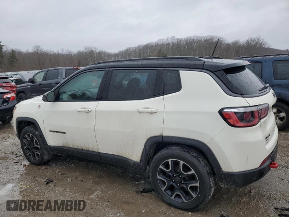 2019 Jeep Compass Trailhawk with VIN 3C4NJDDB0KT671292, listed as a Copart auction lot 46418675 with 175,494 mi miles and Salvage Title. Bid and sale history available at DreamBid. Image 2.