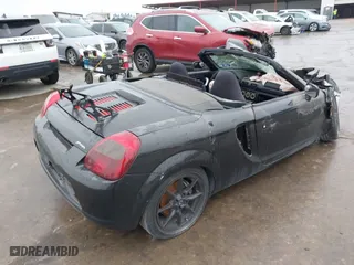 2002 Toyota MR2 Spyder with VIN JTDFR320720045244, listed as a IAAI auction lot 40486938 with 61,802 mi miles. Bid and sale history available at carsss.com. Image 4.