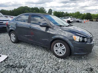 2016 Chevrolet Sonic LT with VIN 1G1JC5SH4G4119418, listed as a Copart auction lot 55809185 with 97,740 mi miles and Salvage title. Bid and sale history available at DreamBid. Image 4.