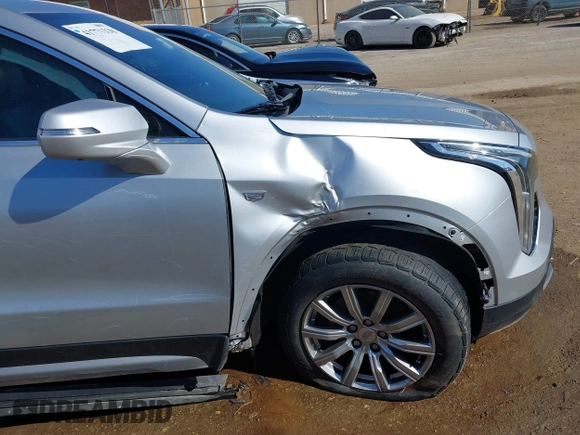 2019 Cadillac XT4 FWD Premium Luxury with VIN 1GYFZCR47KF110481, listed as a IAAI auction lot 41771338 with 103,124 mi miles. Bid and sale history available at carsss.com. Image 6.