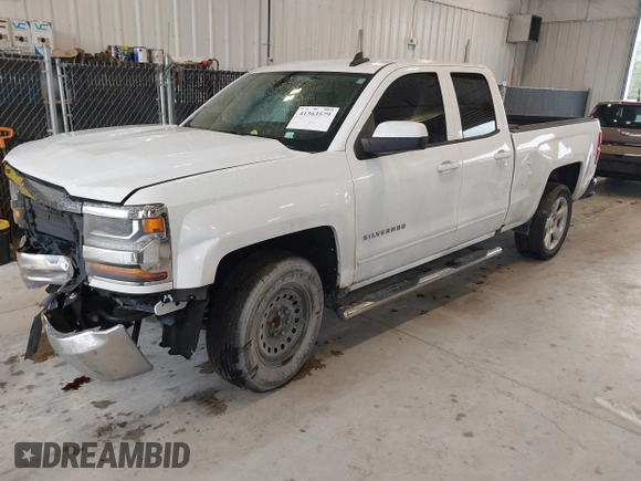 2018 Chevrolet Silverado 1500 LT with VIN 1GCRCREC0JZ204834, listed as a IAAI auction lot 41363579 with 135,247 mi miles and . Bid and sale history available at DreamBid. Image 17.