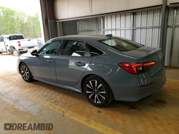 2024 Honda Civic EX z VIN 2HGFE1F78RH331974, wystawiony jako Copart lot #52220315 z przebiegiem 9 331 mil mil oraz Szkoda całkowita • Salvage title. Historia ofert i sprzedaży dostępna na DreamBid. Obrazek 2.