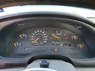1997 Ford Mustang with VIN 1FALP4043VF174092, listed as a Copart auction lot 86983884 with 105,774 mi miles and Salvage Title. Bid and sale history available at carsss.com. Image 9.