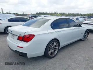 2014 BMW 7 Series 740i with VIN WBAYA6C53ED144195, listed as a IAAI auction lot 41720500 with 123,776 mi miles and . Bid and sale history available at DreamBid. Image 4.