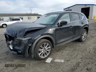 2019 Mazda CX-5 Grand Touring with VIN JM3KFBDM9K1650840, listed as a Copart auction lot 41929185 with 61,814 mi miles and Salvage Title. Bid and sale history available at carsss.com. Image 1.