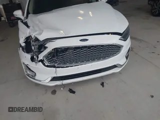 2019 Ford Fusion Titanium with VIN 3FA6P0K95KR271291, listed as a IAAI auction lot 41983320 with 71,962 mi miles and . Bid and sale history available at DreamBid. Image 18.