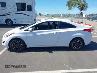 2013 Hyundai Elantra Coupe SE with VIN KMHDH6AE9DU022676, listed as a IAAI auction lot 41816486 with 158,326 mi miles. Bid and sale history available at carsss.com. Image 14.