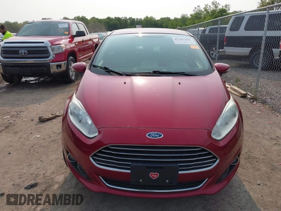 2015 Ford Fiesta Titanium z VIN 3FADP4FJ1FM171680, wystawiony jako IAAI lot #42383105 z przebiegiem 51 396 mil mil oraz . Historia ofert i sprzedaży dostępna na DreamBid. Obrazek 12.