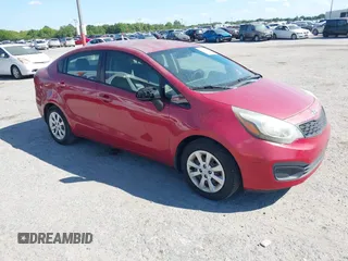 2015 Kia Rio LX with VIN KNADM4A35F6521305, listed as a IAAI auction lot 41906091 with 77,888 mi miles. Bid and sale history available at carsss.com. Image 1.