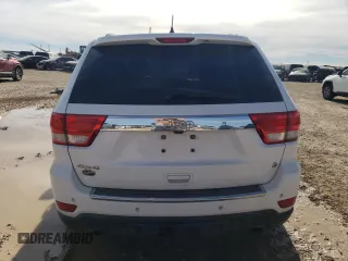 2013 Jeep Grand Cherokee Overland with VIN 1C4RJFCT2DC650336, listed as a Copart auction lot 83830304 with 129,858 mi miles and Clean Title. Bid and sale history available at carsss.com. Image 6.