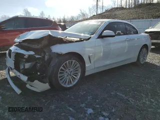 2014 BMW 4 Series 428i xDrive with VIN WBA3T1C54EPS98016, listed as a Copart auction lot 43812335 with 57,634 mi miles and Salvage Title. Bid and sale history available at carsss.com. Image 1.