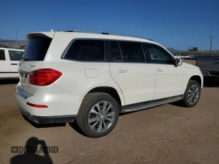2014 Mercedes-Benz GL 450 z VIN 4JGDF7CE0EA395164, wystawiony jako Copart lot #51081185 z przebiegiem 92 321 mil mil oraz Szkody całkowita. Historia ofert i sprzedaży dostępna na DreamBid. Obrazek 3.