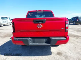2022 Nissan Frontier SV z VIN 1N6ED1EJ3NN612086, wystawiony jako IAAI lot #41603542 z przebiegiem 65 797 mil mil oraz . Historia ofert i sprzedaży dostępna na DreamBid. Obrazek 16.