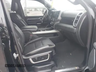 2021 Ram 1500 Laramie with VIN 1C6SRFJT6MN580803, listed as a IAAI auction lot 41207914 with 56,891 mi miles and . Bid and sale history available at DreamBid. Image 5.
