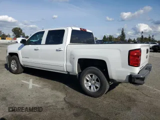 2016 Chevrolet Silverado 1500 LT with VIN 3GCPCREC8GG184042, listed as a Copart auction lot 51370505 with 68,989 mi miles and Salvage Title. Bid and sale history available at DreamBid. Image 2.