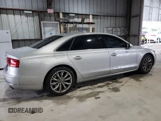 2012 Audi A8 z VIN WAURVAFD4CN038599, wystawiony jako Copart lot #59554025 z przebiegiem 93 334 mil mil oraz Szkoda całkowita • Salvage title. Historia ofert i sprzedaży dostępna na DreamBid. Obrazek 3.