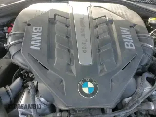 2016 BMW 5 Series 550i xDrive with VIN WBAKP9C58GD980321, listed as a Copart auction lot 84250044 with 100,052 mi miles and Salvage title. Bid and sale history available at DreamBid. Image 15.