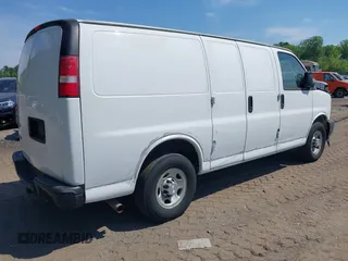 2017 Chevrolet Express Cargo Van with VIN 1GCWGAFF2H1133906, listed as a IAAI auction lot 42037388 with 218,601 mi miles. Bid and sale history available at carsss.com. Image 4.