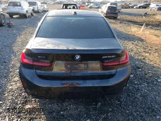 2024 BMW 3 Series M340i xDrive with VIN 3MW49FF00R8E53312, listed as a Copart auction lot 87704185 with 0 mi miles and Salvage Title. Bid and sale history available at carsss.com. Image 6.