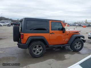 2011 Jeep Wrangler Sport with VIN 1J4AA2D16BL589390, listed as a IAAI auction lot 41478801 with 153,013 mi miles. Bid and sale history available at carsss.com. Image 13.
