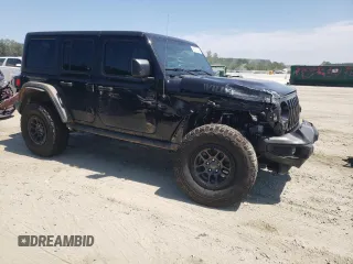 2023 Jeep Wrangler Willys with VIN 1C4HJXDG7PW520719, listed as a Copart auction lot 68978644 with 35,667 mi miles and Clean Title. Bid and sale history available at DreamBid. Image 4.