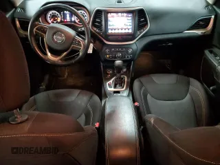 2015 Jeep Cherokee Latitude with VIN 1C4PJMCS0FW787988, listed as a Copart auction lot 52105155 with 117,254 mi miles and Salvage Title. Bid and sale history available at DreamBid. Image 8.