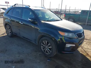 2012 Kia Sorento SX with VIN 5XYKW4A26CG207358, listed as a IAAI auction lot 41521909 with 215,689 mi miles. Bid and sale history available at carsss.com. Image 1.
